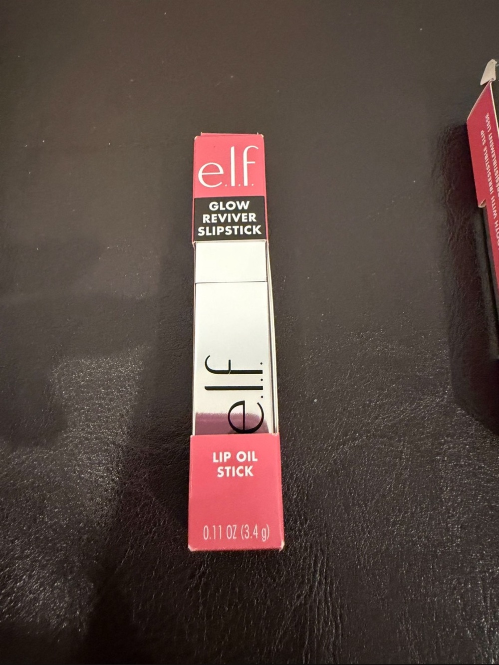 New elf Glow Reviver Slipstick Lip Oil in Loveslick